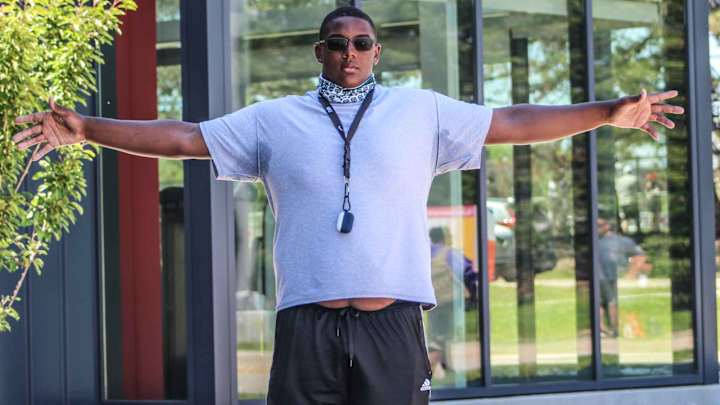 Massive Michigan Target Breaks Down Recent Official Visit As National Signing Day Approaches