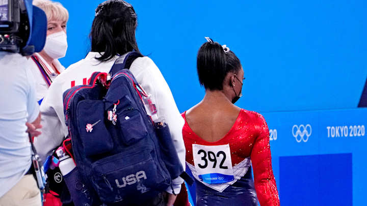 Simone Biles Leaves Floor With Trainer, Withdraws From Women's Team Final
