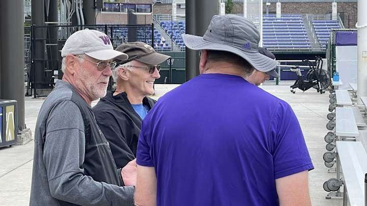 Husky Practice Draws Coaching Icon as Hart Comes for a Look