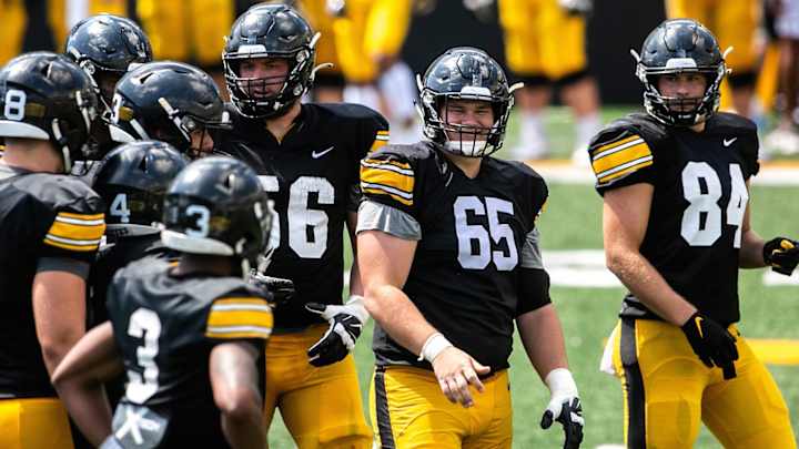 Opposing Sideline: Tyler Linderbaum Center of Attention on Iowa's Offensive Line Opposing Sideline: Tyler Linderbaum Center of Attention on Iowa's Offensive Line
