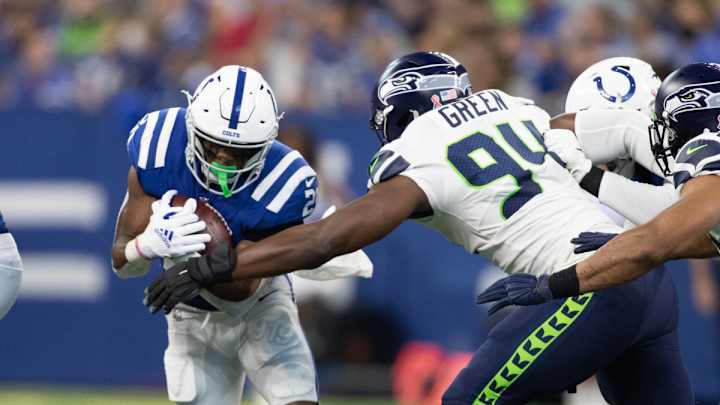 Seahawks' Defensive Line Flexes Muscles in Season-Opening Romp