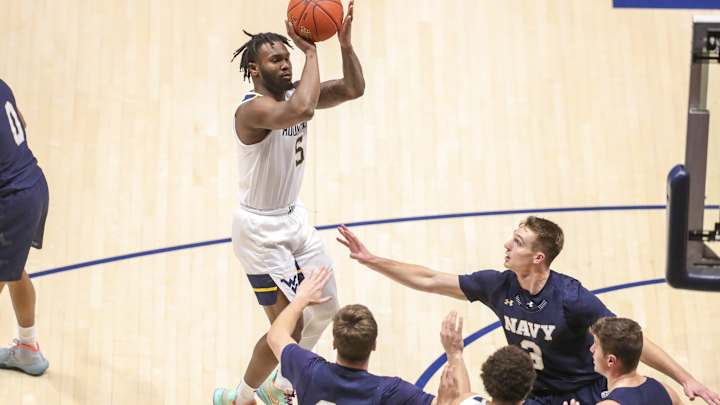 West Virginia Cruises Past Navy