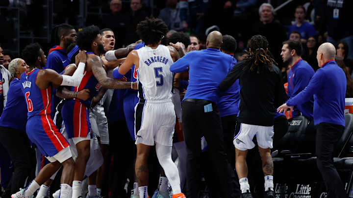Magic Punched in Mouth After Brawl, Loss vs. Pistons Magic Punched in Mouth After Brawl, Loss vs. Pistons