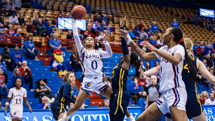 Jayhawks dominate second half, break losing streak against Mountaineers.