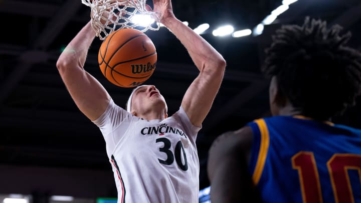 Three Man Weave: Cincinnati Thrashes Tulsa 81-55