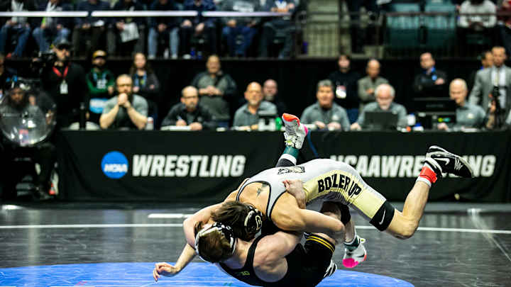 Mother of Iowa Wrestling’s Spencer Lee Destroys Glasses After Upset Loss