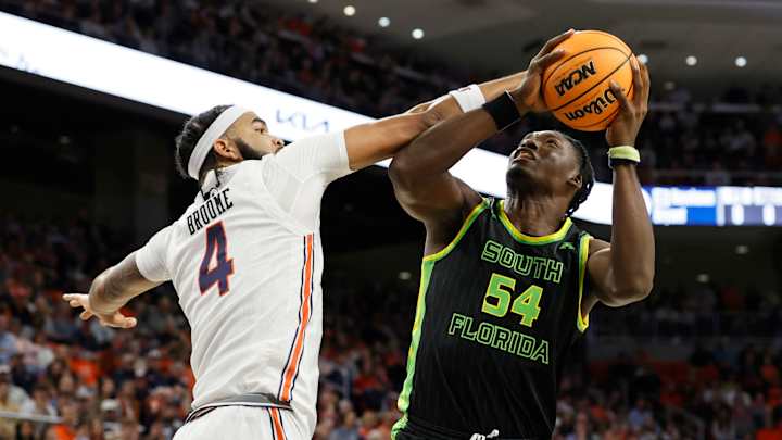 Auburn basketball reaches out to South Florida center Russel Tchewa Auburn basketball reaches out to South Florida center Russel Tchewa