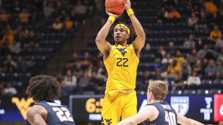 Current + Former WVU Players React to Huggins Resigning as Head Coach