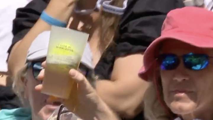Stray Wimbledon Shot Amazingly Lands in Fan’s Drink Stray Wimbledon Shot Amazingly Lands in Fan’s Drink