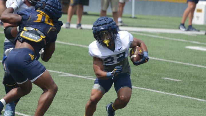 Uninhibited Play is the Name of the Game for WVU Football