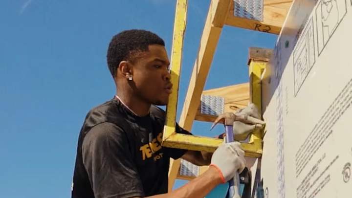 Watch: Tennessee Football Gives Back to Community Through Habitat for Humanity