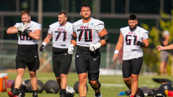 Falcons Training Camp Notebook: O-Line Struggles in First Padded Practice