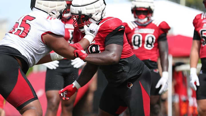 Louisville's Tell, Lole Fueling Intense Competition for Starting Nose Tackle