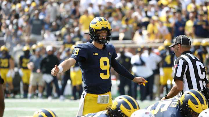 Michigan Uses Eight Quarterbacks in Blowout Win Over UConn