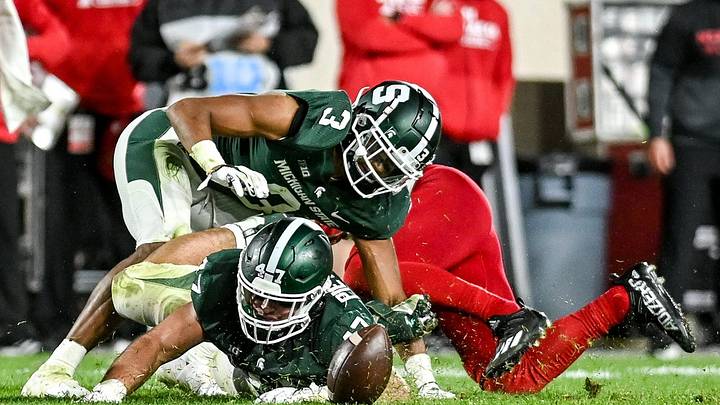 Injury Update: Xavier Henderson, Jacob Slade is dressed and warming up for Michigan State vs. Ohio State