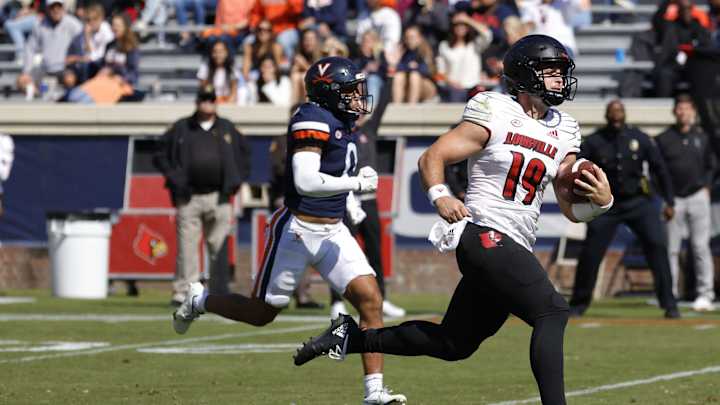 Shorthanded Louisville Defeats Virginia for First ACC Win