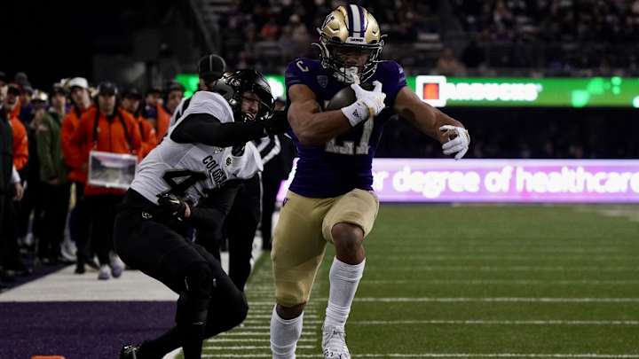 Taulapapa Plays Well for the Huskies, for Late Virginia Teammates Taulapapa Plays Well for the Huskies, for Late Virginia Teammates