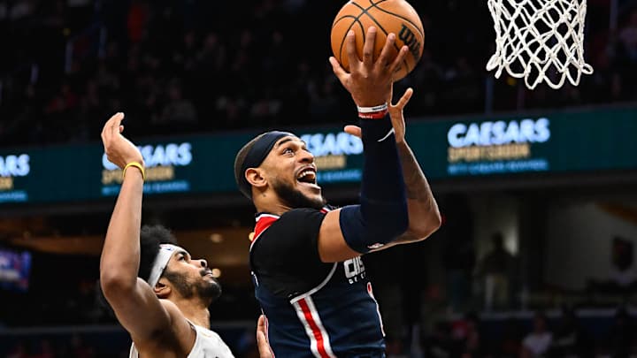 Two Former Hogs Given New Homes at Trade Deadline