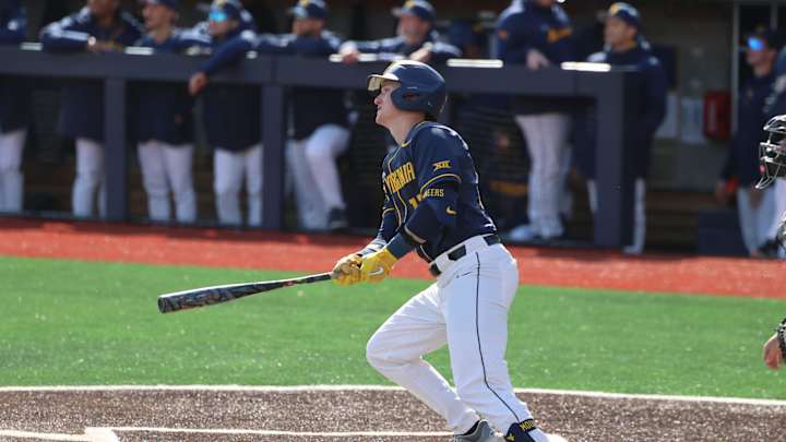 West Virginia Powers Past Marshall