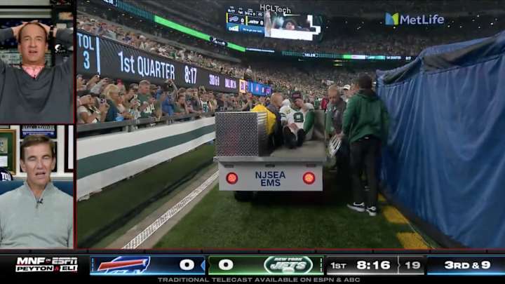 Peyton Manning and Eli Manning Couldn’t Believe Injured Aaron Rodgers Needed to Leave Game on Cart