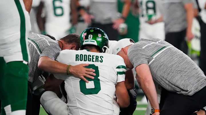 Aaron Rodgers Injures Achilles on Jets' Fourth Offensive Play Aaron Rodgers Injures Achilles on Jets' Fourth Offensive Play