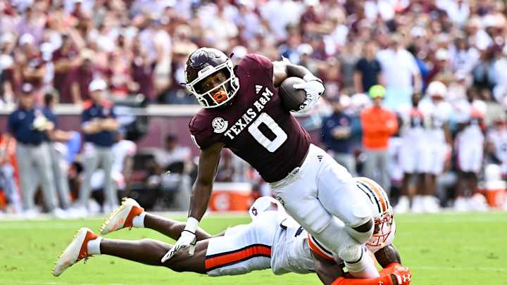 WATCH: Jimbo Fisher nearly gets in the way of Auburn scoop and score