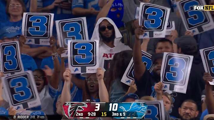 A Sad Falcons Fan Surrounded by Happy Lions Fans Became a Meme