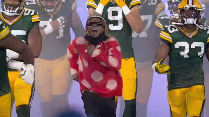 Lil Wayne, Packers Superfan, Leads Team Out of Tunnel Before Lions Game Lil Wayne, Packers Superfan, Leads Team Out of Tunnel Before Lions Game