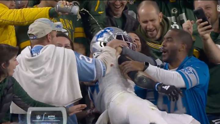 Packers Fan Pours Beer on Amon-Ra St. Brown After Lions TD