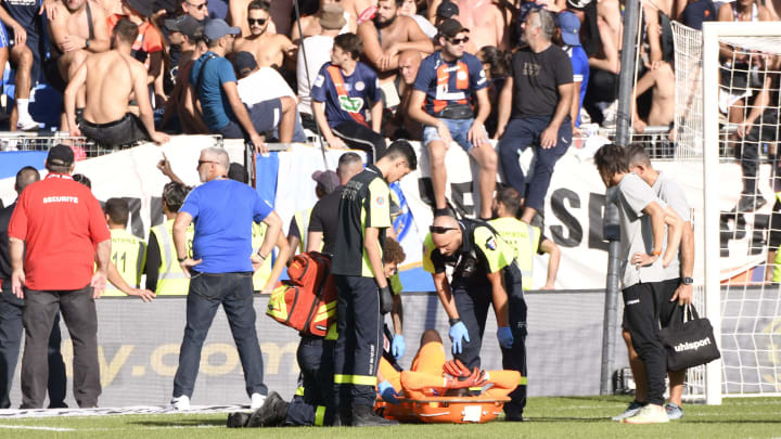 French Ligue 1 Match Abandoned After Clermont Goalkeeper Stunned by Firework French Ligue 1 Match Abandoned After Clermont Goalkeeper Stunned by Firework