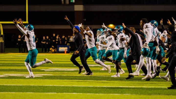 Coastal Carolina OL Drinks Beer Thrown on Field After Win Over Appalachian State