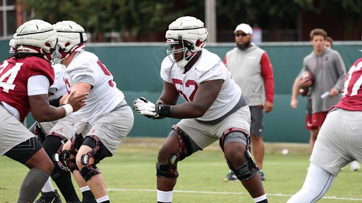 Tyler Booker Addresses Left Tackle Concerns, Leading Younger Players with JC Latham