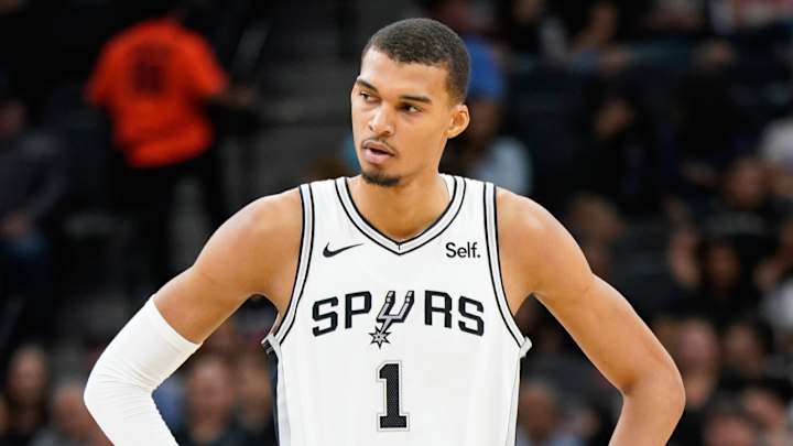 Victor Wembanyama Scratched From Spurs-Mavericks After Stepping on Ball Boy’s Foot Victor Wembanyama Scratched From Spurs-Mavericks After Stepping on Ball Boy’s Foot