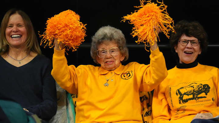 CU Event Center crowd sings to Buffs mega fan Peggy Coppom for 99th birthday