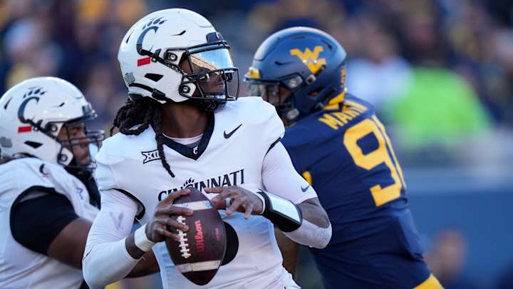 Final Huddle: West Virginia Punishes Cincinnati 42-21 Final Huddle: West Virginia Punishes Cincinnati 42-21