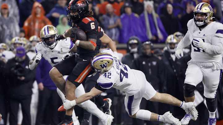 Beat-Up Husky Defense Took Some Hits, Kept Its Feet in Corvallis