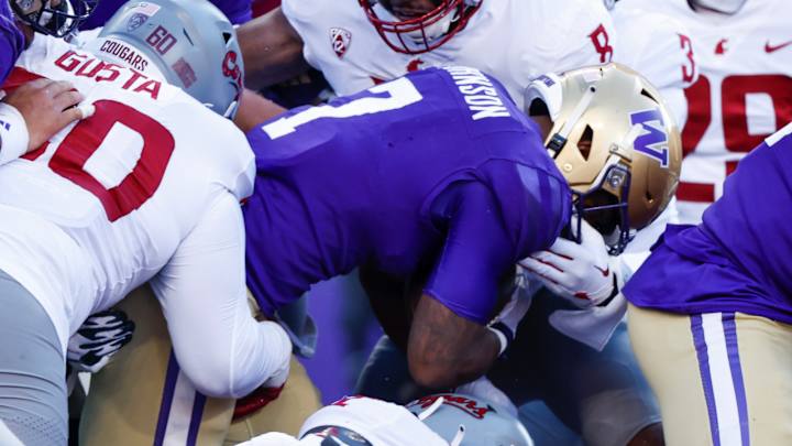 Johnson Shoulders UW Rushing Load, Which Drew Mixed Reviews