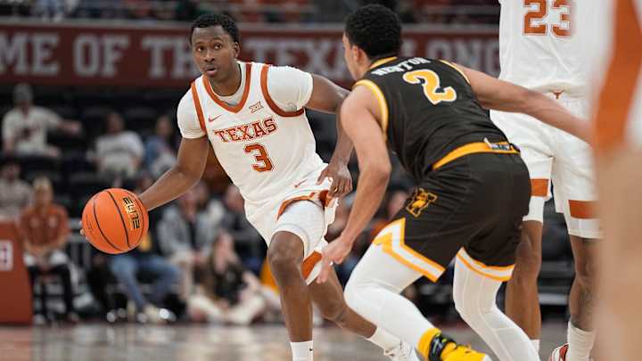 Max Abmas Leads Texas Longhorns Past Wyoming Cowboys for Fifth Win of Season