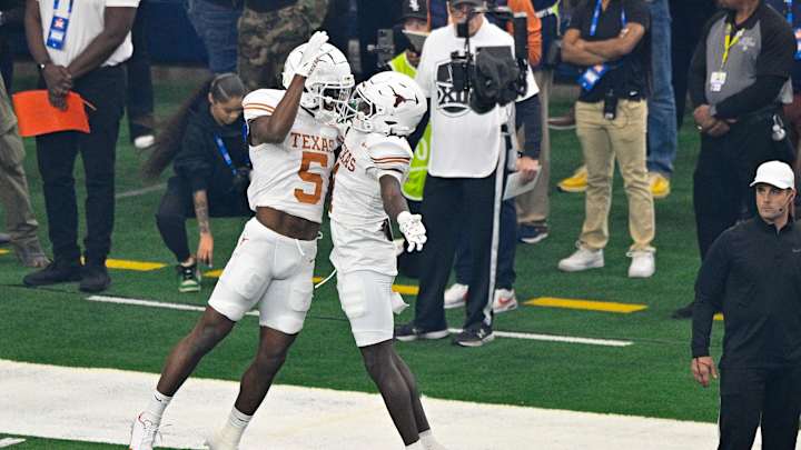 Texas Longhorns Dominate Oklahoma State Cowboys, Win Big 12 Championship Texas Longhorns Dominate Oklahoma State Cowboys, Win Big 12 Championship