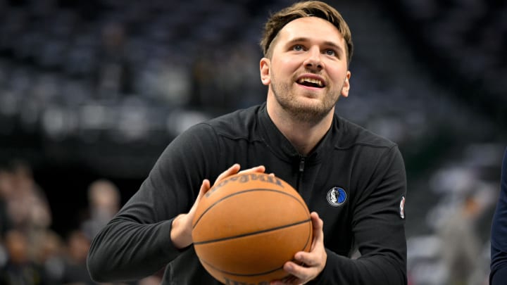 Luka Dončić Made a Half-Court Shot That Left His Coaches Doing Push-Ups
