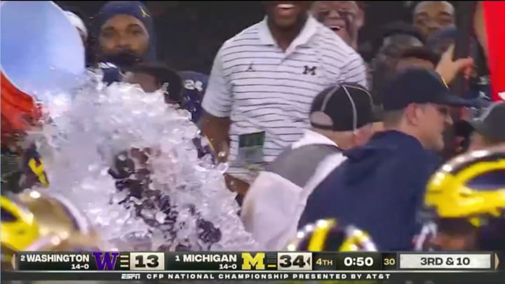 Jim Harbaugh Expertly Dodged His Gatorade Bath As Michigan Won the National Championship