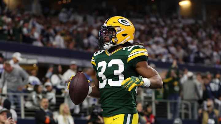 Aaron Jones Ran So Hard Packers Had to Literally Restitch His Jersey During Game vs. Cowboys