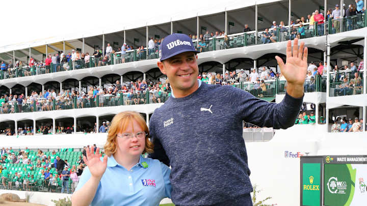Amy shows Waste Management Phoenix Open fans she's still got it with Gary Woodland