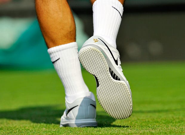 federer orange sole shoes