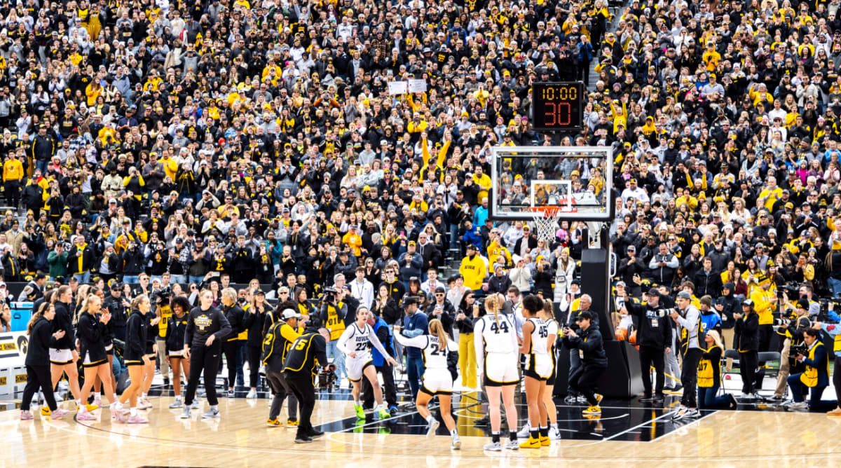 The Coolest Scenes From Iowa Women's Basketball Game at School's Football  Stadium