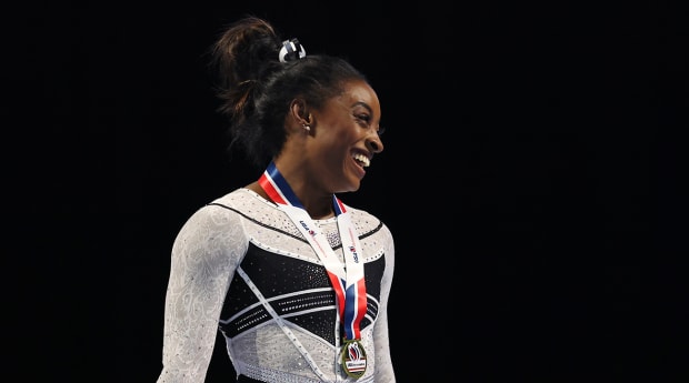 Simone Biles adds to her legend by winning sixth world