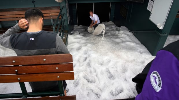Photo of Hail Completely Buries Rockies’ Dugout, Stadium Before Game vs. Dodgers