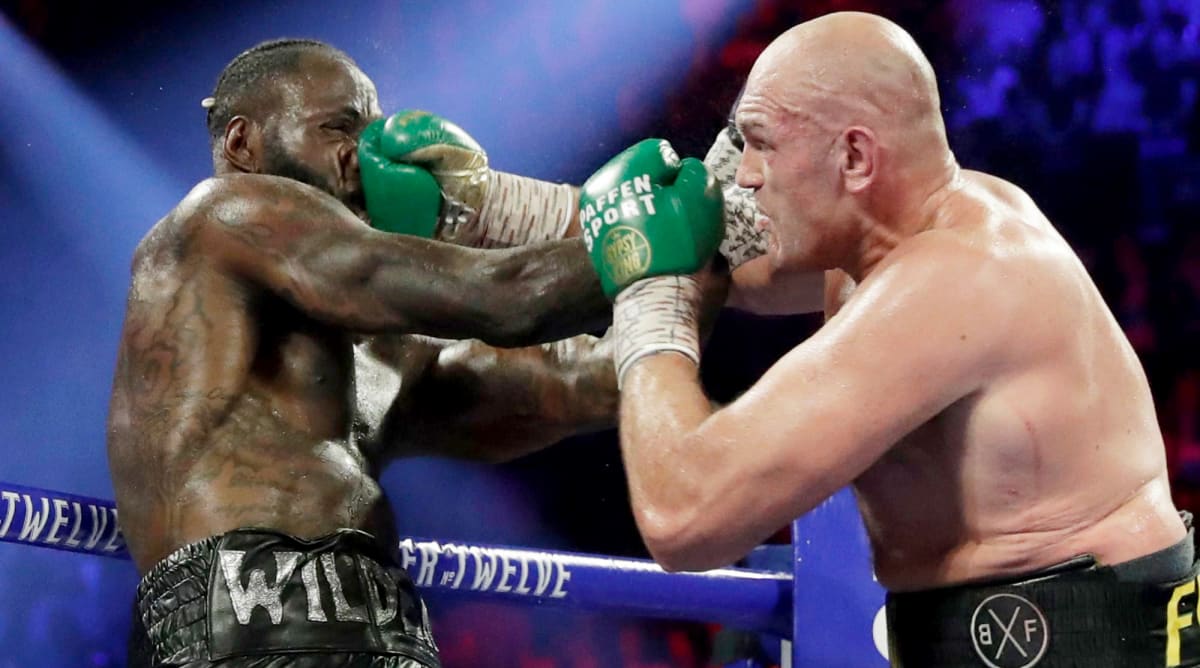 Wilder Keeping Trainer Who Threw in Towel vs. Fury