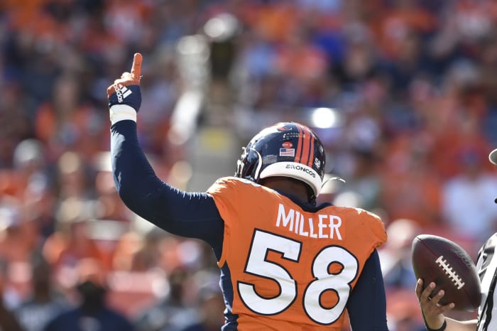 Denver Broncos outside linebacker Von Miller (58) celebrates his 100th career sack at Empower Field in Mile High.