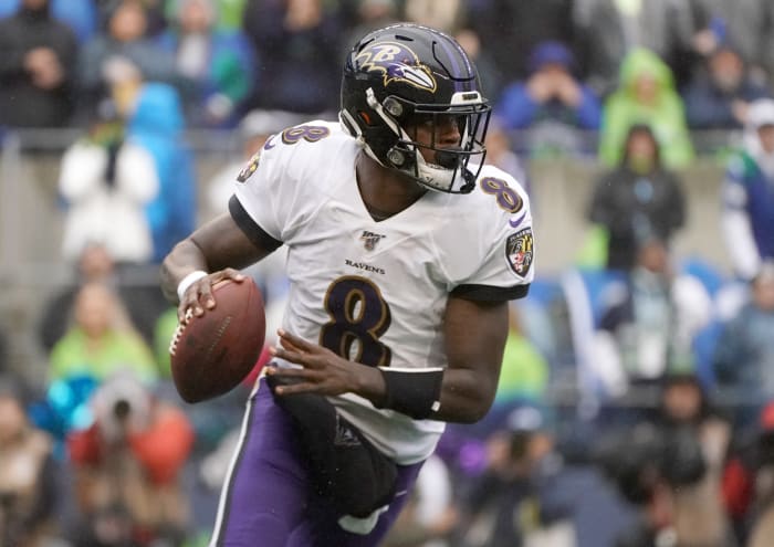 October 20, 2019;  Seattle, Washington, USA;  Baltimore Ravens quarterback Lamar Jackson (8) throws a pass in the second quarter against the Seattle Seahawks at CenturyLink Field.  Mandatory Credit: Kirby Lee - USA TODAY Sports